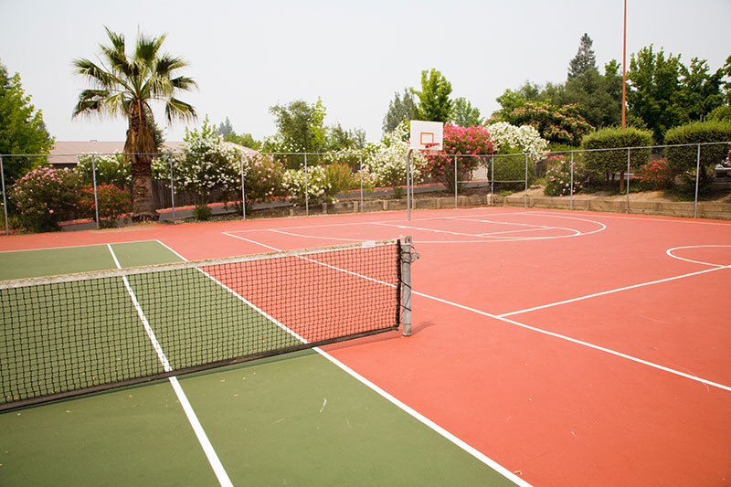 view of tennis and basketball sports courts